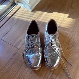 Leila Stone Drew Metallic Silver Wingtip Oxfords